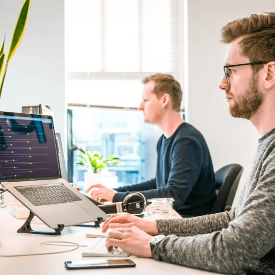 Marketing specialists working at their computers